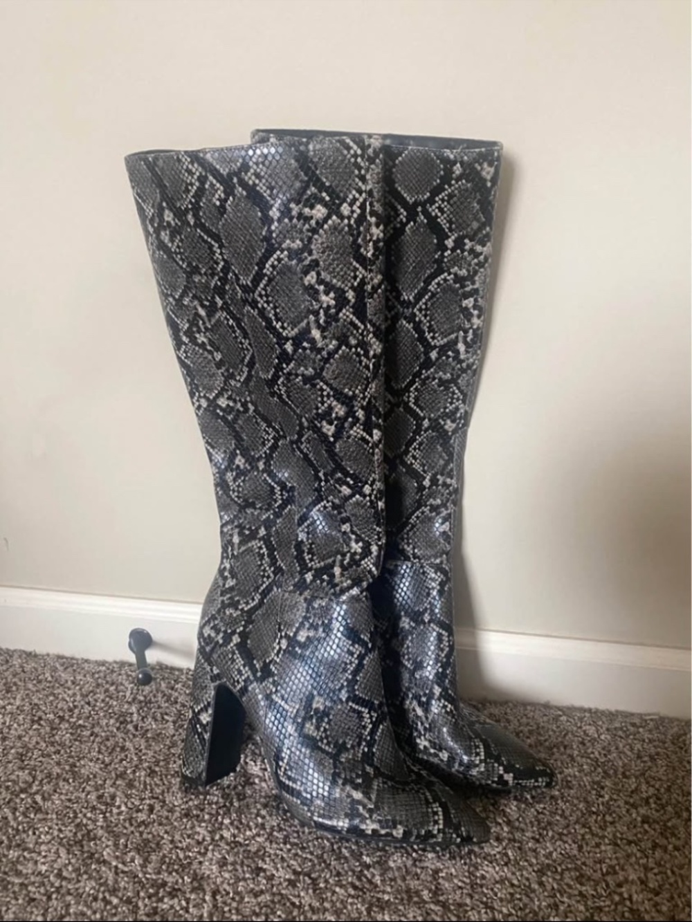 Heeled snakeskin boots